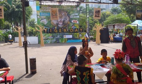 Anak-anak meramaikan Tiger Global Day 2019 di SCBD, Jakarta, Sabtu (27/7).