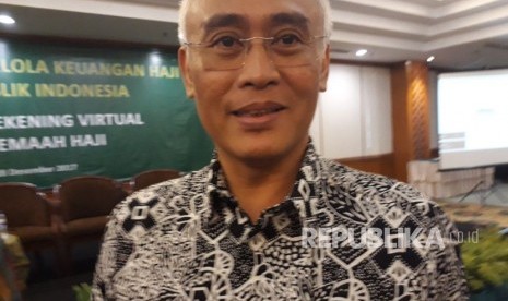  Anggota Badan Pengelola Keuangan Haji (BPKH), A Iskandar Zulkarnain menjelaskan tentang rekening virtual (virtual account) untuk calon jamaah haji Indonesia di Jakarta, Kamis (28/12).