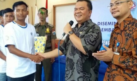 Anggota Komisi VII DPR dari Fraksi Partai Golkar (FPG) Ivan Doly Gultom.