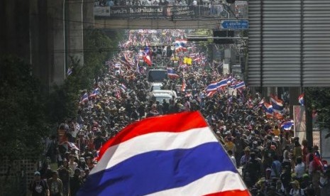 Anti-government protesters take part in a rally in central Bangkok January 30, 2014.