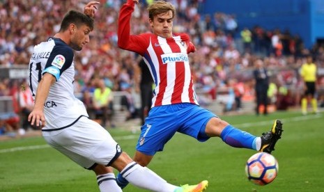 Antoine Griezmann (kanan).