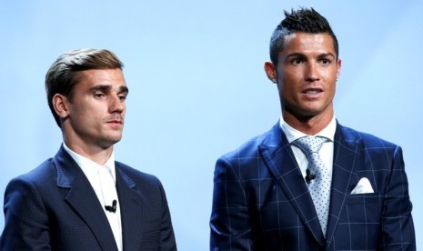 Antoine Griezmann (kiri) dan Cristiano Ronaldo.