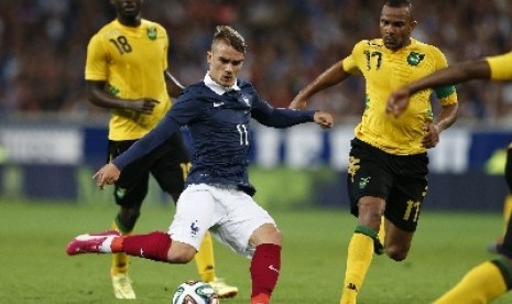 Antoine Griezmann (tengah).