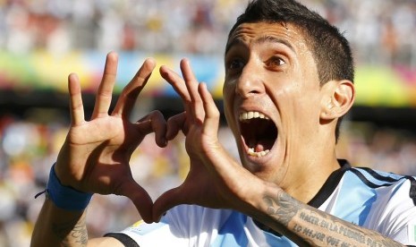 Argentina's Angel Di Maria celebrates scoring against Switzerland during extra time in their 2014 World Cup round of 16 game at the Corinthians arena in Sao Paulo July 1, 2014