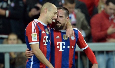 Arjen Robben (kiri) dan Franck Ribery