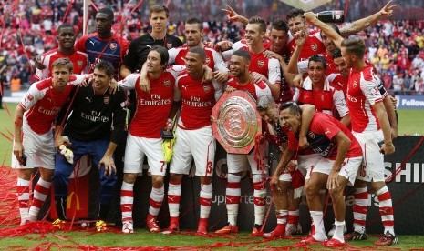 Arsenal merayakan kemenangannya meraih Community Shield setelah mengalahkan Manchester City 3-0