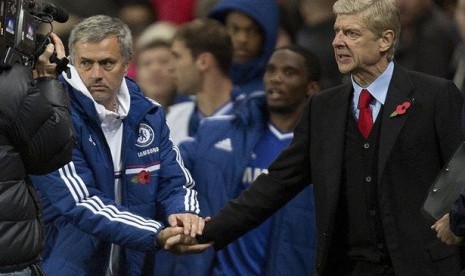 Arsene Wenger bersama Jose Mourinho