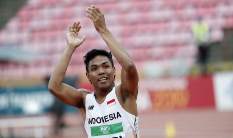 Pelari Indonesia Lalu Muhammad Zohri melakukan selebrasi seusai menang dalam perlombaan Atletik IAAF World U20 Championships cabang lari 100 meter di Tampere, Finlandia, Kamis (11/7). Lehtikuva/Kalle Parkkinen via REUTERS 