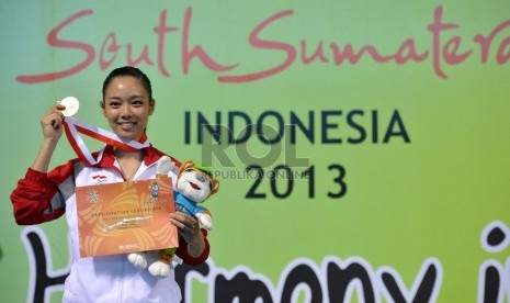    Atlet Wushu Indonesia Lindswell berhasil meraih medali emas pada nomor Taiji Jian putri dalam ajang ISG 2013 di Jakabaring, Palembang,Sumsel, Senin (30/9).  (Republika/Prayogi)