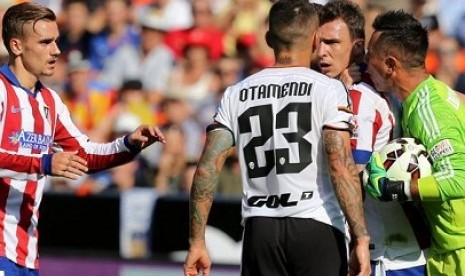 Atletico Madrid vs Valencia berakhir imbang 1-1, Senin (9/3) dini hari WIB.