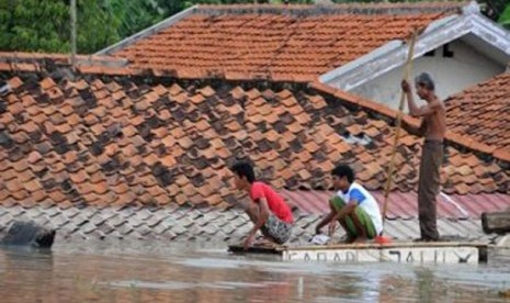 Warga korban banjir (foto ilustrasi).