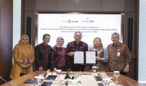 Bank bjb kembali menorehkan milestone baru pengembangan KUB melalui penandatanganan Perjanjian Kerja Sama (PKS) penyertaan modal dengan Bank Jambi.