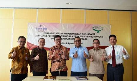 Bank bjb syariah dengan PT. Asuransi Askrida Syariah menandatangani kerjasama Asuransi Pembiayaan Modal Kerja Jasa Pemborongan dan Pengadaan Barang/Jasa