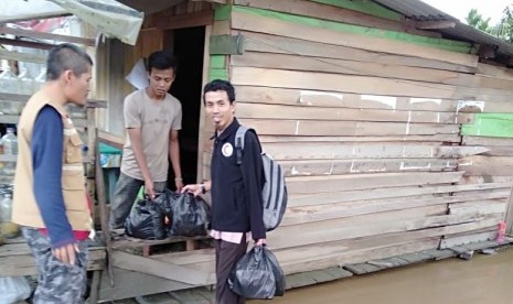 Bantuan BSMI Cabang Jayawijaya  untuk warga korban banjir besar di Sentani, Papua.