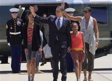 Barack Obama bersama Michelle Obama, Sasha dan Malia.