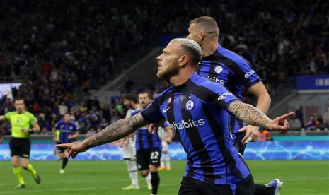 Bek Inter Milan federico Dimarco merayakan golnya ke gawang Juventus dalam laga Coppa Italia.