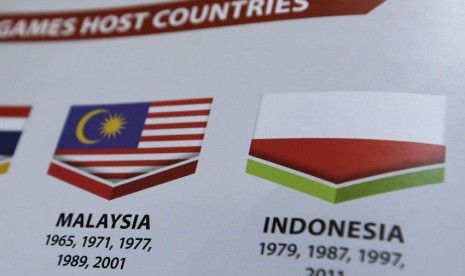 Bendera merah putih tampak dicetak terbalik di buku panduan SEA Games ke-29 di Malaysia.