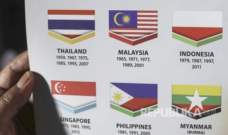 Bendera merah putih tampak dicetak terbalik di buku panduan SEA Games ke-29 di Malaysia.