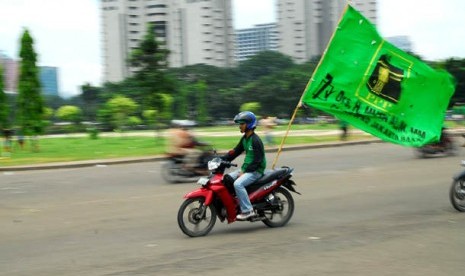 Bendera PPP. Pengamat menilai PPP gagal ke Senayan karena tidak lagi memiliki tokoh Islam sentral.