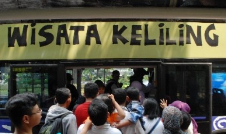 Berlibur di dalam kota bisa jadi alternatif wisata saat dana sedang mepet.