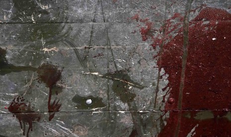 Blood stains are seen on a wrecked rebel truck in a Donetsk neighborhood May 27, 2014.