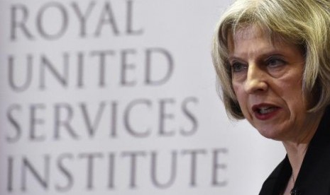 Britain's Home Secretary Theresa May delivers a speech at RUSI (Royal United Services Institute) in central London, November 24, 2014.