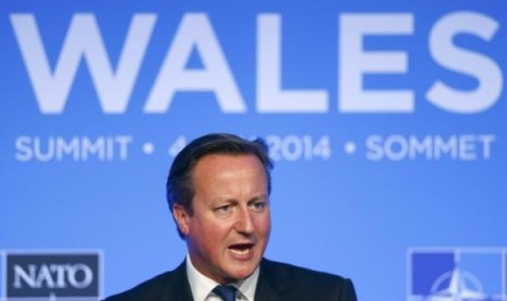 Britain's Prime Minister David Cameron speaks during a news conference on the second and final day of the NATO summit at the Celtic Manor resort, near Newport, in Wales September 5, 2014.