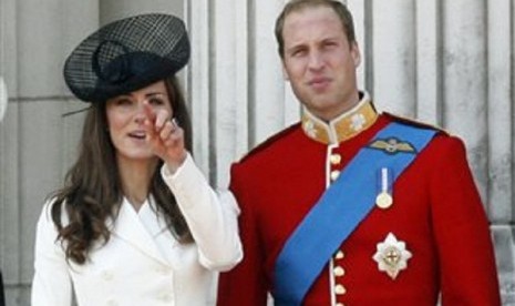   Britain's Prince William, Duke of Cambridge (right) is with his wife Catherine, Duchess of Cambridge, in London, in this, June 11, 2011