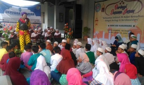 BSI memberikan santunan kepada 1.200 anak yatim dan dhuafa di 18 kota se-Indonesia.