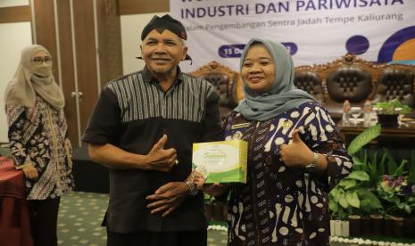  Bupati Sleman Kustini Purnomo saat membuka Workshop Sinergi Industri dan Pariwisata dalam Pengembangan Sentra Jadah Tempe Kaliurang di Atrium Hotel.