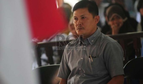 Bupati Sumedang, Ade Irawan saat menjalani sidang pertama terkait kasus dugaan korupsi perjalanan dinas DPRD Cimahi tahun anggaran 2011 di ruang sidang tipikor 1, Kota Bandung, Senin (27/7).  