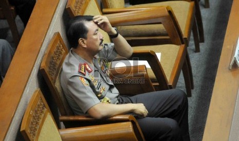 Calon Kapolri Komjen Pol Budi Gunawan menghadiri sidang paripurna  penetapan Calon Kapolri di Kompleks Parlemen Senayan, Jakarta, Kamis (15/1). (Republika/Agung Supriyanto)