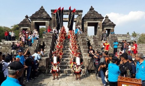 Bregodo troops welcome Asian Games' flame at     Ratu Boko Temple in Bokoharjo village, Prambanan, Sleman, Yogyakarta.