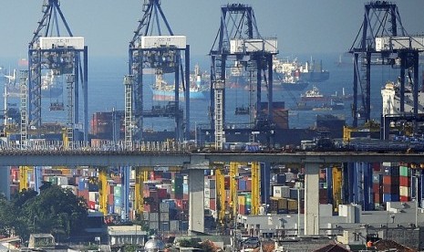 Cargo loading process in Tanjung priok port in Jakarta (illustration)