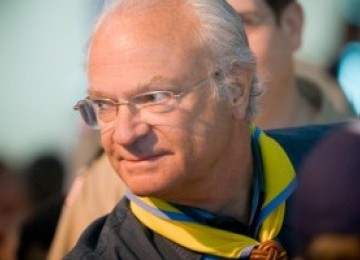 Carl XVI Gustaf of Sweden in boy scout uniform (ilustration). 