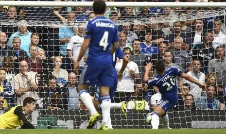 Chelsea's John Terry (R) scores an own goal during their English Premier League soccer match against Swansea at the Stamford Bridge in London September 13, 2014