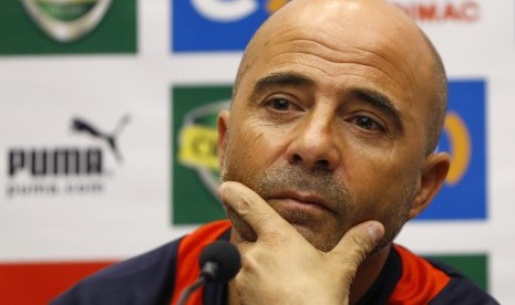 Chile's soccer team manager Jorge Sampaoli gestures, during a press conference at Wembley Stadium in London, Thursday, Nov. 14, 2013. England will play Chile in a friendly soccer match at the stadium on Friday. 