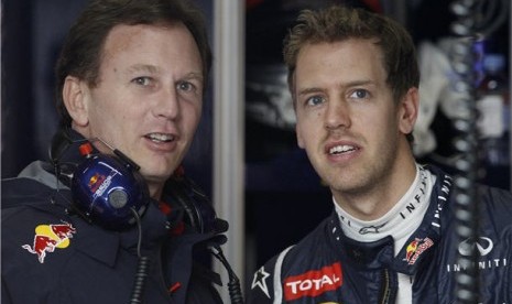 Red Bull menghargai keputusan Honda yang hengkang dari Formula 1 setelah musim 2021 (Foto: bos Red Bull, Christian Horner (kiri) dan Sebastian Vettel)