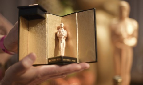 Cokelat berbentuk patung piala Oscar kreasi chef Wolfgang Puck. Gelaran Oscar tahun ini menuntut nominator untuk menunjukkan bukti vaksinasi dan dua kali hasil negatif tes PCR.