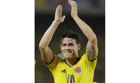 Colombia's James Rodriguez celebrates after a 2014 World Cup qualifying match against Ecuador in Barranquilla, Colombia, Friday, Sept. 6, 2013. Colombia won 1-0