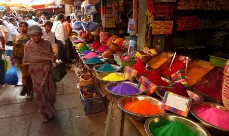 Colors Holi at a market in Mysore, India. People holds Holi festival in March every year. (illustration)