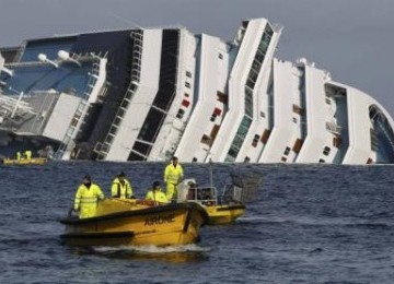 Costa Concordia cruise ship is half-submerged and threatening to slide into deeper waters. The ship ran aground off the west coast of Italy at Giglio island on January 13th.  