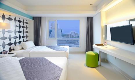 Cozy Room di Crown Prince Hotel Surabaya.