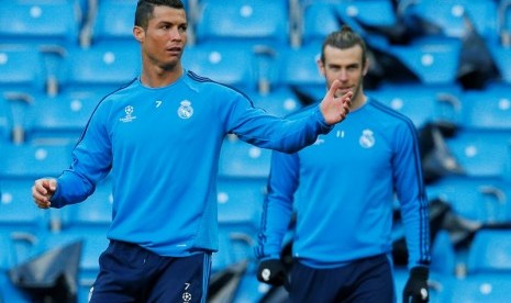 Cristiano Ronaldo (kiri) dan Gareth Bale