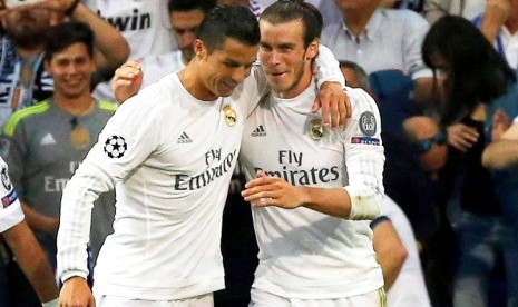 Cristiano Ronaldo (kiri) dan Gareth Bale.