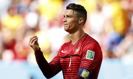 Cristiano Ronaldo mengekspresikan kekecewaannya usai Portugal tersingkir dari Piala Dunia 2014