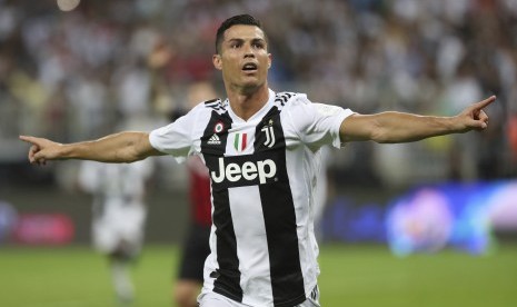  Cristiano Ronaldo merayakan golnya untuk Juventus di final melawan AC Milan di stadion King Abdullah, Saudi Arabia, Kamis.