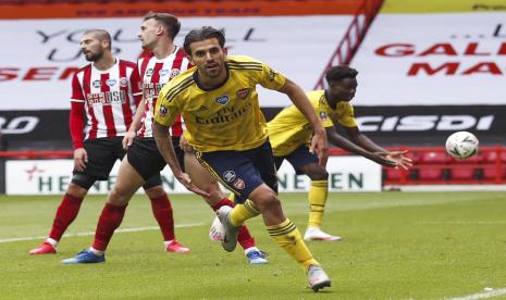 Dani Caballos mencetak gol kemenangan Arsenal atas Sheffield United pada laga perempat final Piala FA, Ahad (28/6). Arsenal menang 2-1 atas Sheffield United.