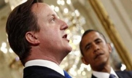 David Cameron saat menjadi tamu Presiden AS, Barack Obama.