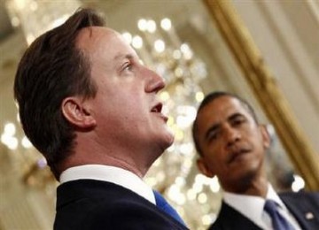 David Cameron saat menjadi tamu Presiden AS, Barack Obama.